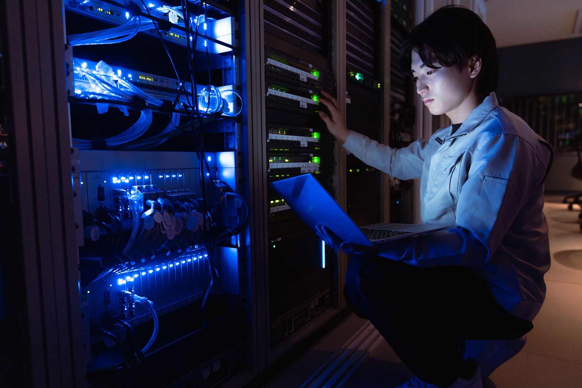 Technician working in server room